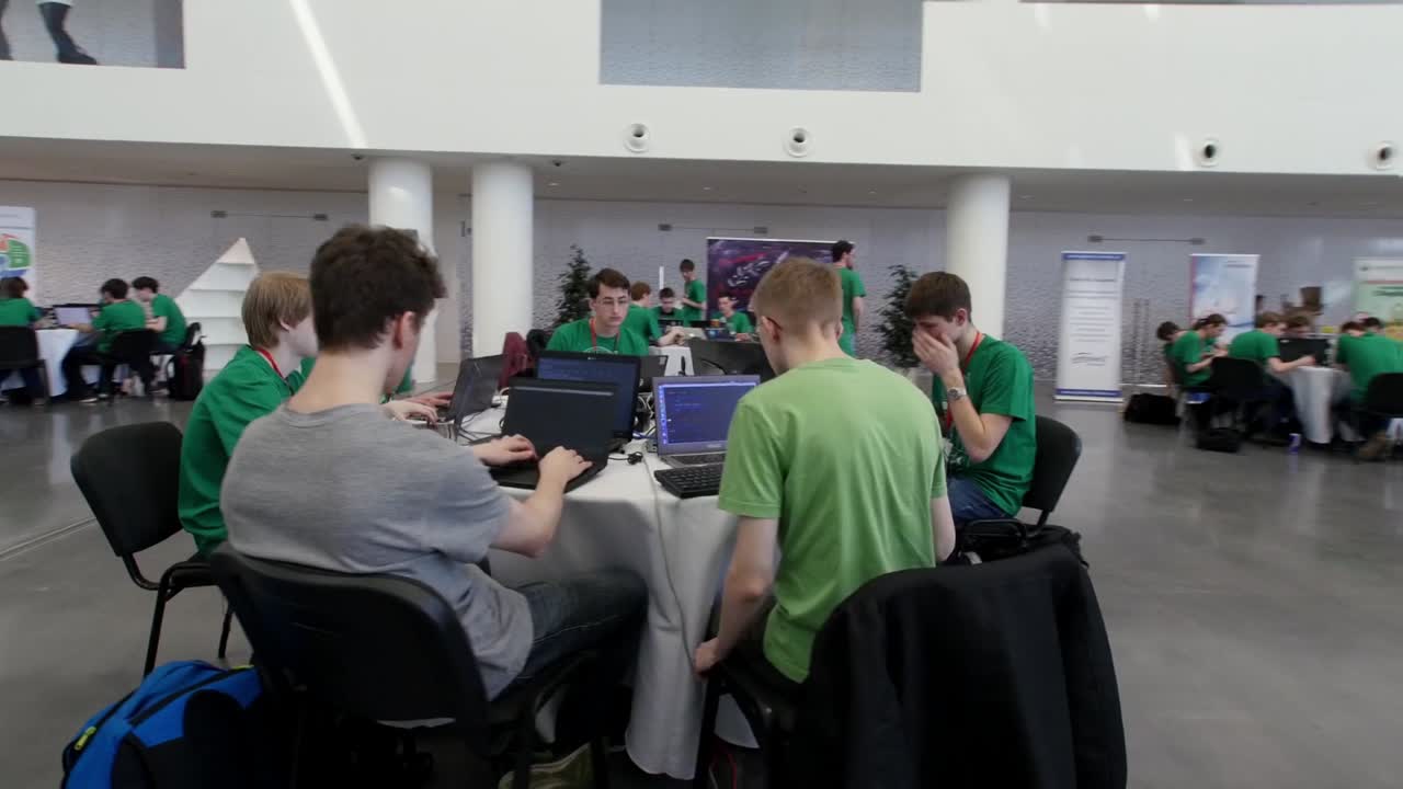 Students coding at a hackathon