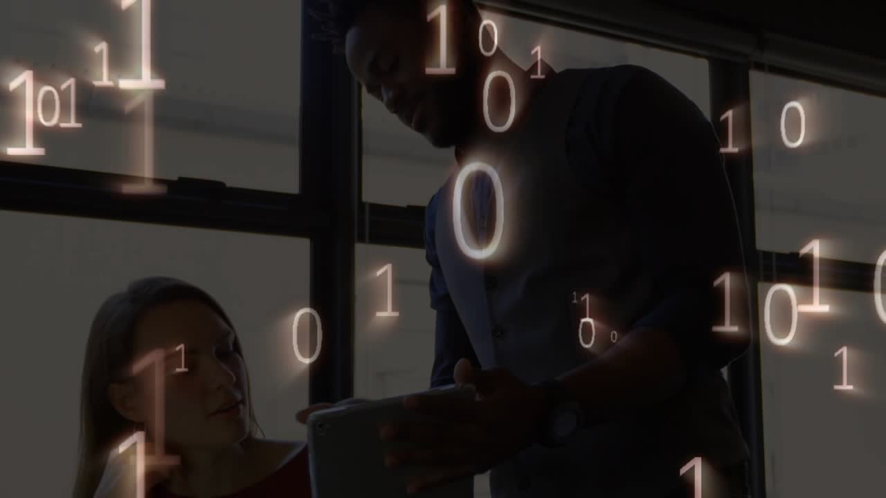 Male colleague approaching woman with tablet, guiding business data analysis amid binary streams