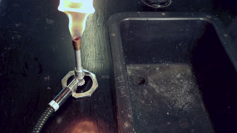 lighting a bunsen burner with a sparker and too much propane