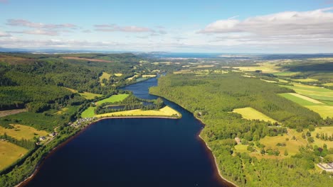 flight over loch ness towards inverness, scottish highlands, scotland, united kingdom