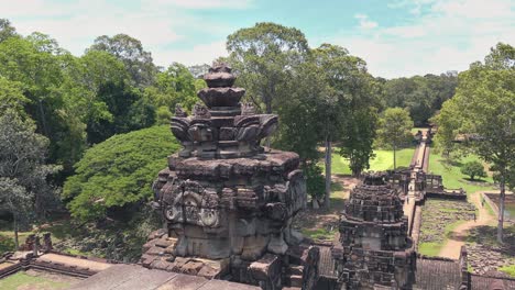 close shot of an ancient temple rising out of the jungle