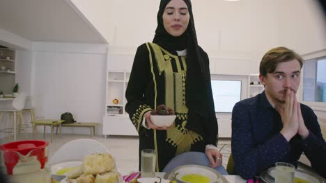 family having dates during ramadan dinner or iftar