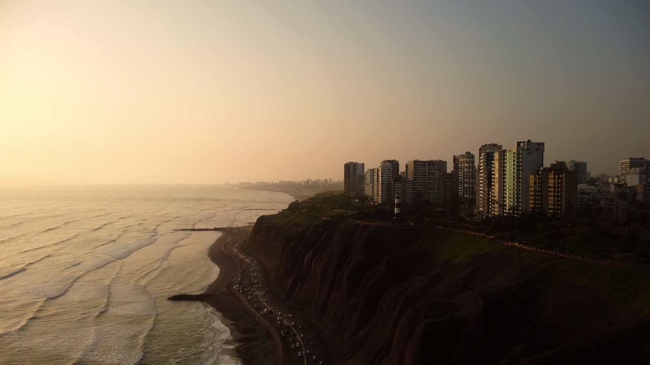 Hyper lapse aerial view of the traffic on Circuito de Playas road and the shore of Miraflores, Peru
