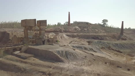 the são domingos mine by drone, a deserted open-pit mine in corte do pinto, alentejo, portugal