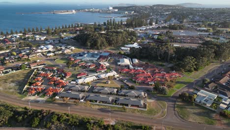 orbit shot of residential area in front of ocean, esperance town, western australia