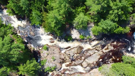 Top-View-Of-Rapids-Over-Rocks-At-Duchesnay-Falls-Trail-In-North-Bay,-Ontario,-Canada