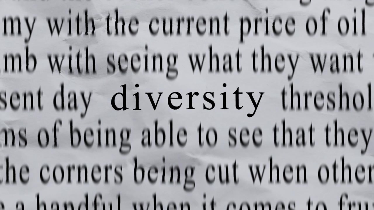 DIVERSITY Text in Centre with High-energy Fast Text Stop-Motion Writing Cycling Rapidly on Crinkled Texture Paper. Newspaper Cuttings Style animation. 4K.