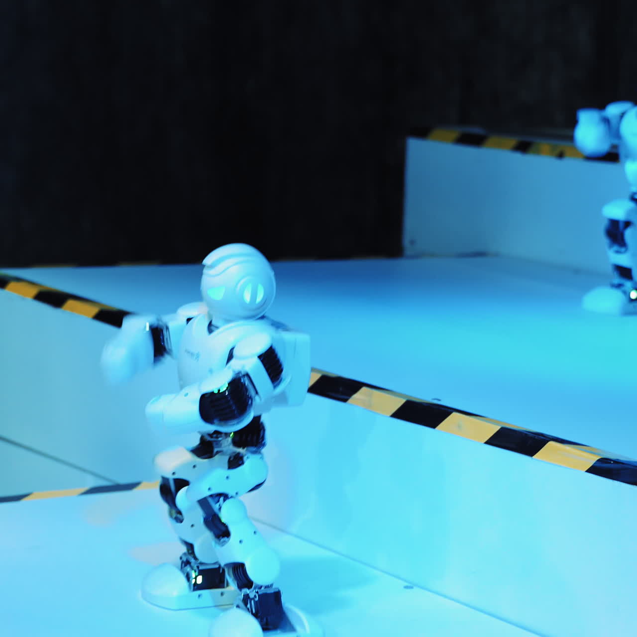 Robots dancing in an exhibition. Smart Robot. Robotic technology