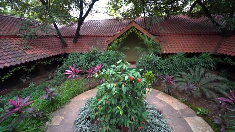 cottage surrounded by plants wide angle shot
