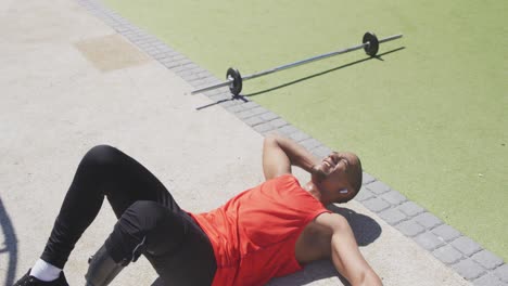 side view man with prosthetic leg lying down