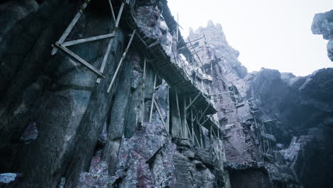 cliffside ruins show ancient architecture built within rocky landscape