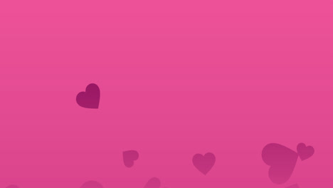 Purple-hearts-floating-upwards-on-a-pink-background
