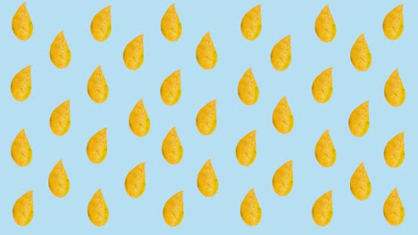 animación de filas de hojas amarillas de otoño sobre fondo azul