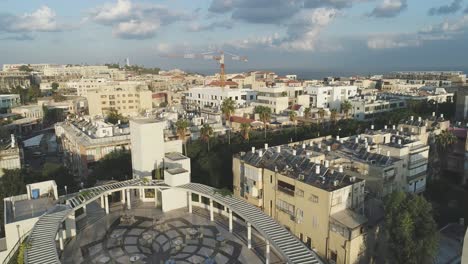 aerial drone view above scientology church building in tel aviv israel. scientology is a belief system and practices as human is an immortal and resident in a physical body and life after death