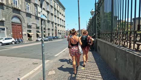 tourists explore street market in naples, italy