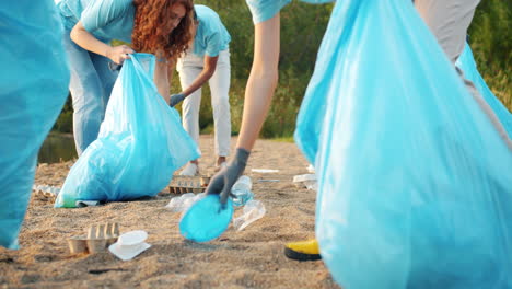Community Volunteers Cleaning Up Beach Litter
