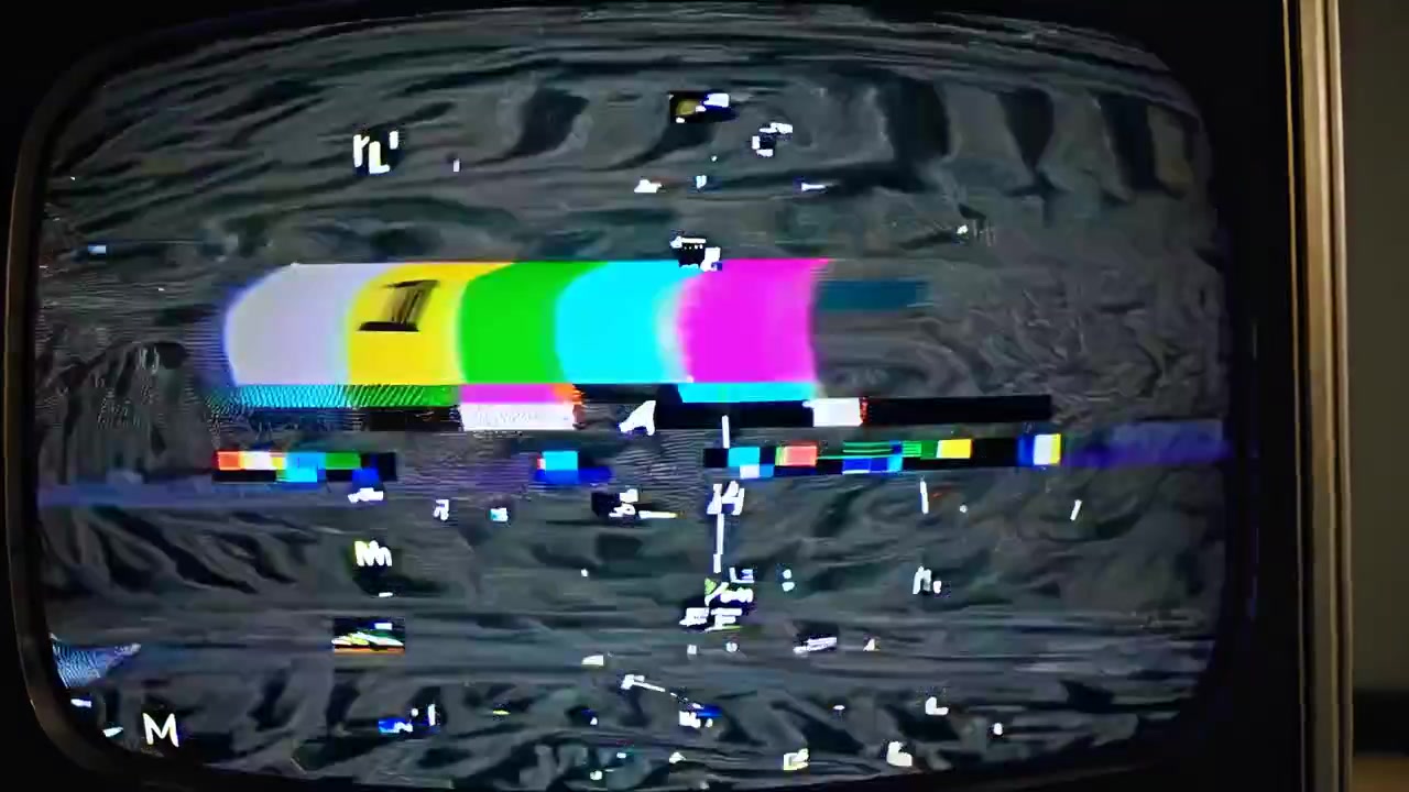 Retro CRT TV Screen Displaying Glitch Art and Static Interference