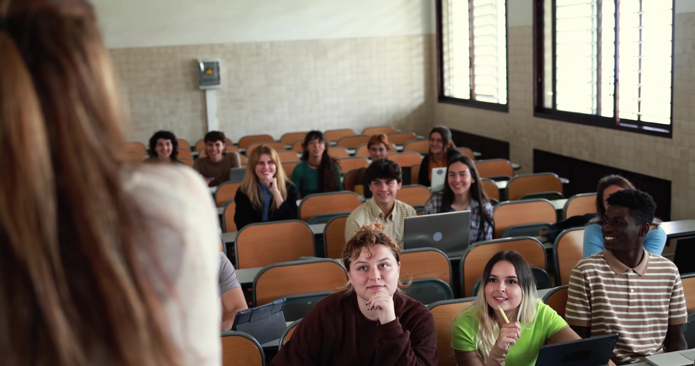 Teacher Giving a Lecture to Students in a University Classroom