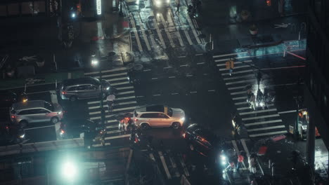 rainy night city street intersection