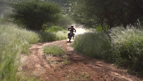 dirt bikers racing around a corner