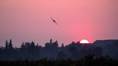 a vintage ct-33 silver star jet flying at abbotsford airshow at sunset