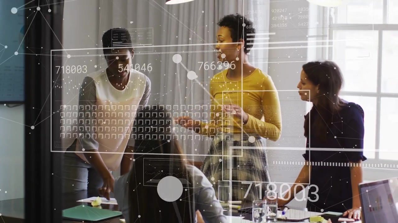 Team leaning table, woman in yellow pointing and starting HUD overlaying charts for business review