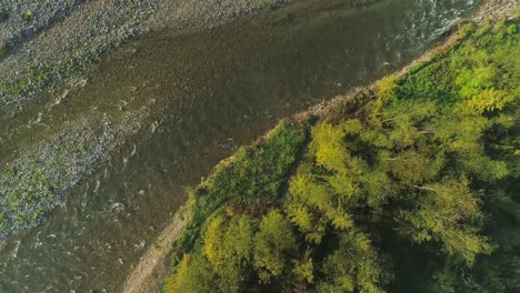 aerial top down rising over bialka river, poland