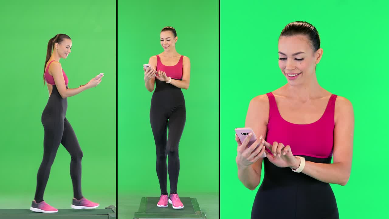 mujer joven y deportiva usando su teléfono y reloj inteligente mientras camina en una pantalla verde, clave de croma