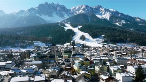 aerial view of the alpine town of san candido in italy.