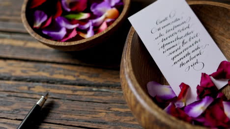 romantic rose petals and calligraphy