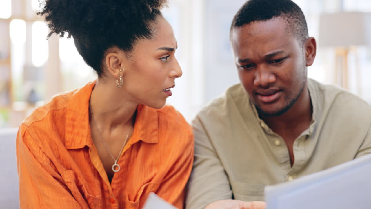 Stress, documents and couple on couch