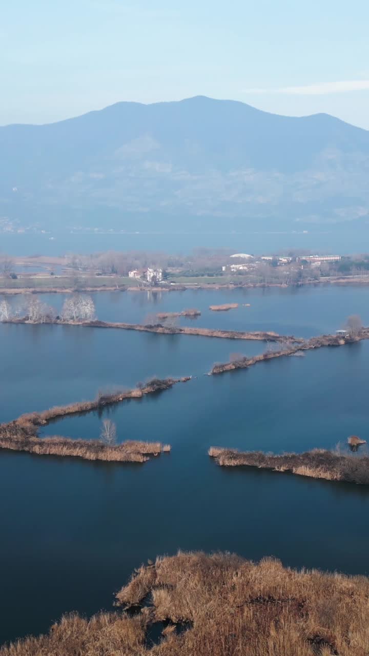 Scenic Lake Landscape with Islands and Mountains