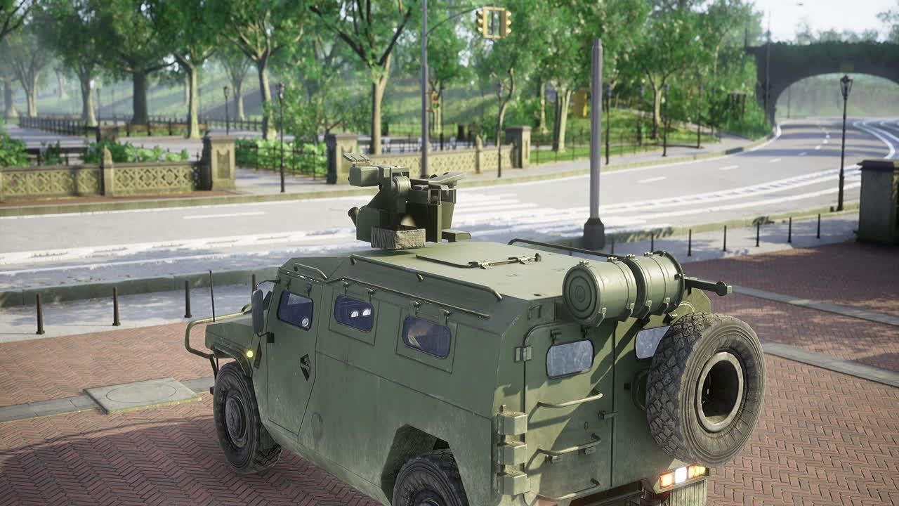 Military vehicle stationed on a quiet urban street during afternoon sunlight