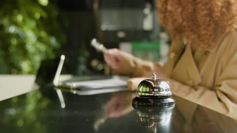 close up view of reception bell on a counter