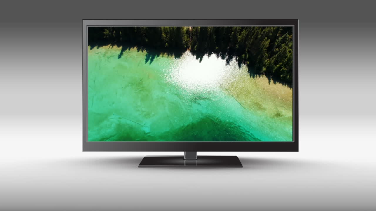 televisión con una vista de un lago en su pantalla