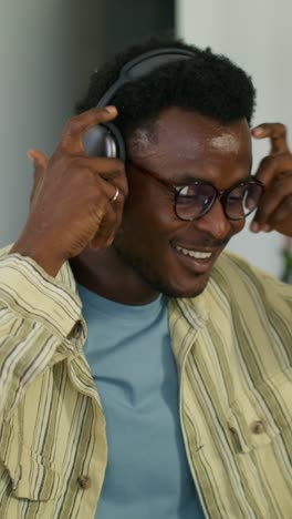 man wearing headphones and glasses