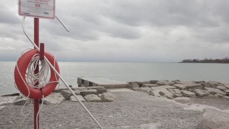safety gears and equipment placed at one side of the beach - medium shot