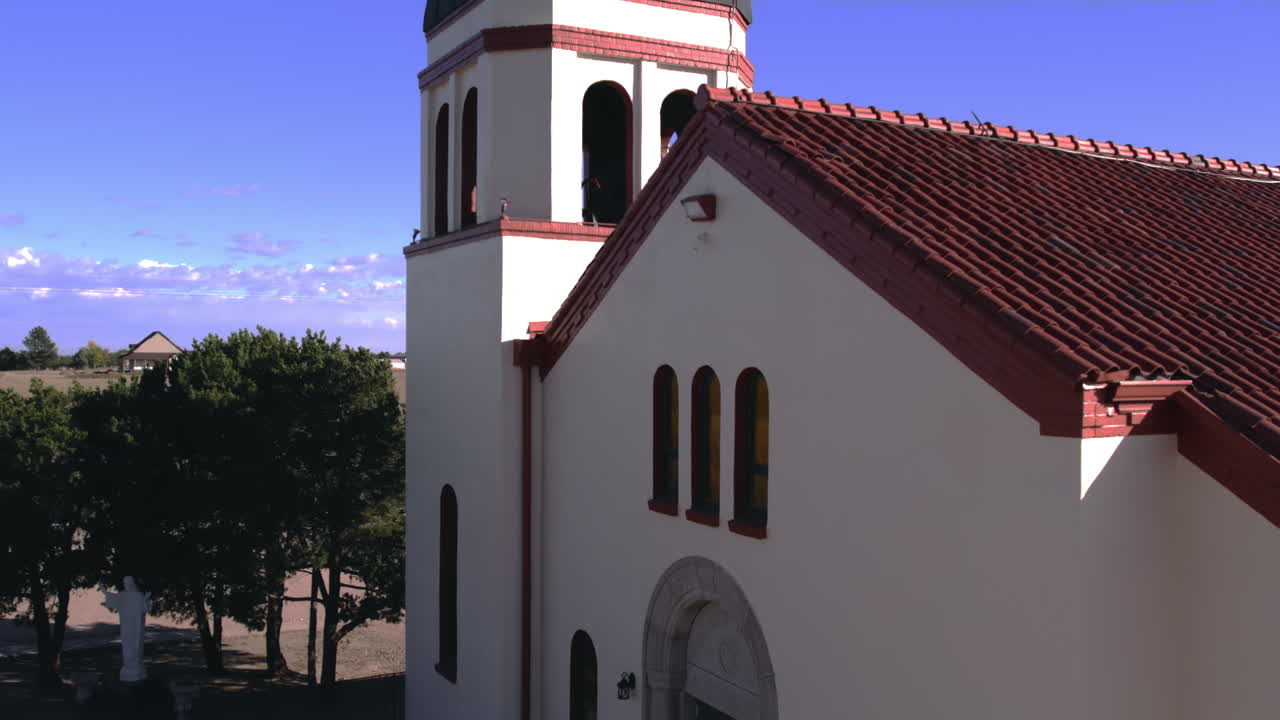 Drone up to Bell Tower of Small Church in Countryside