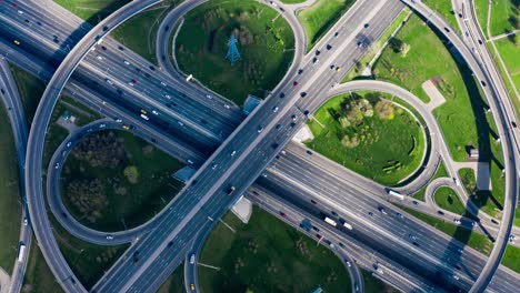 timelapse aerial view of a freeway intersection traffic trails in moscow.