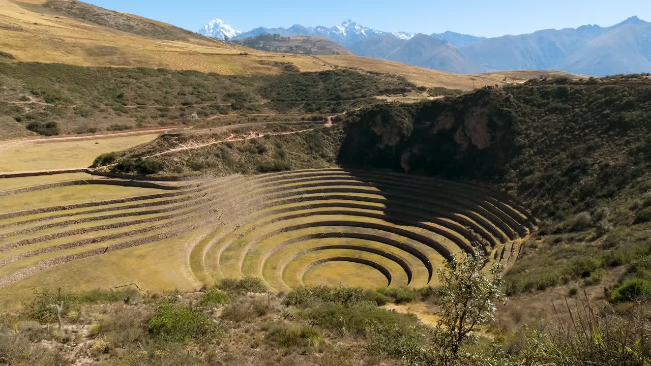 Captures the incredible agricultural terraces of the Moray archaeological site. A testament to ancient Inca engineering, the unique concentric circles create a stunning, otherworldly landscape