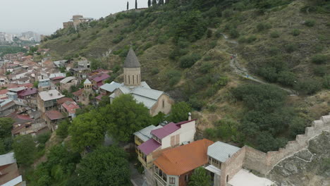 aerial dolly out shot of the lower and upper betlemi churches in tbilisi