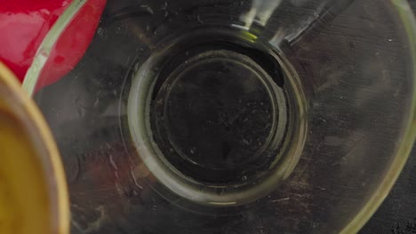 pouring ingredients into a bowl