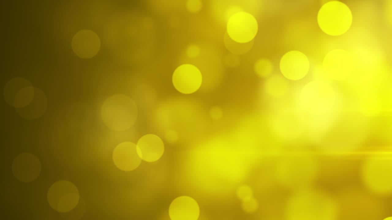 partículas de oro suaves en movimiento sobre un fondo amarillo verdoso - video 4k