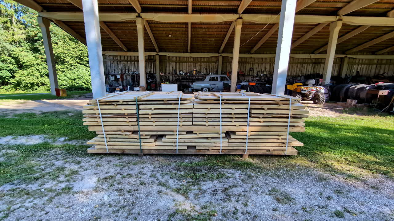 Prefabricated wood slat panels pile tied together by cable tie outdoor