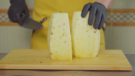 cutting a pineapple