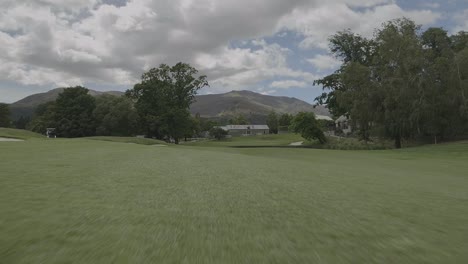 Golf-field-with-a-flag-on-the-distance