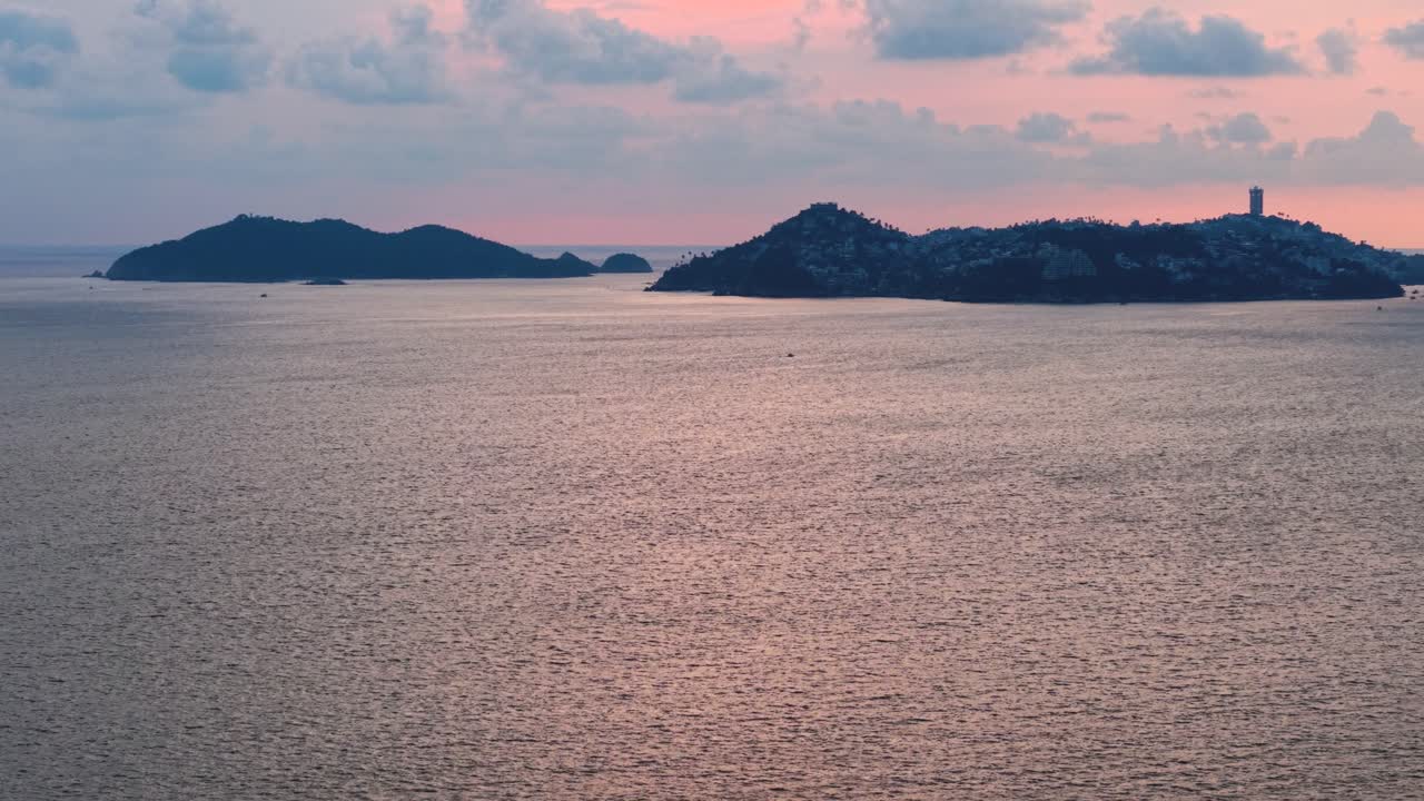 Golden hour drone shot over Acapulco Bay, Mexico