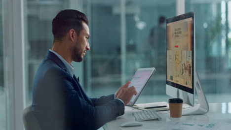 hombre de negocios trabajando en una tableta digital y una computadora en la oficina
