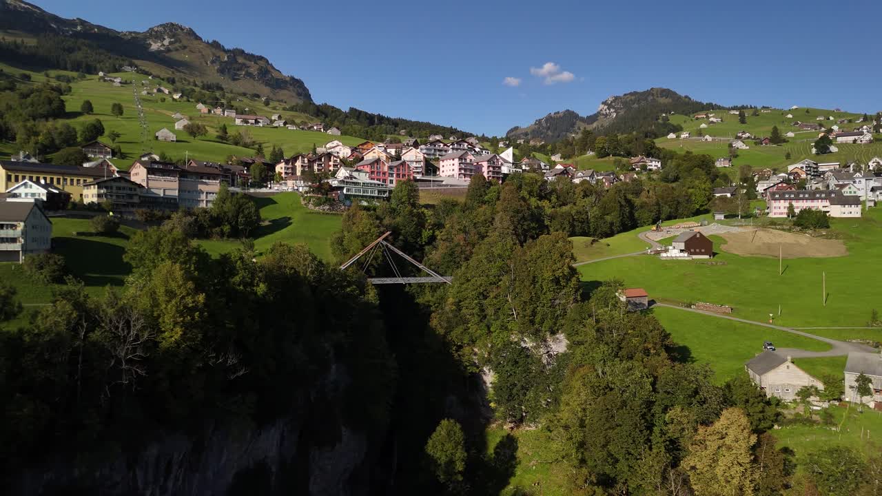 Village sky resort town summer, Switzerland Swiss valley holiday destination