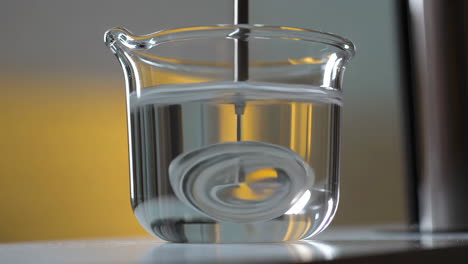 mixing liquids in a beaker